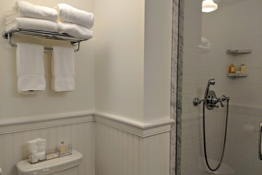 Bathroom with a toilet and a shower in The Fireplace Room in Westerly, RI