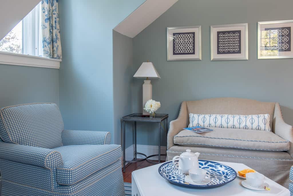 A serving tray of tea on a coffee table in the sitting area of one of the suites in our New England bed and breakfast
