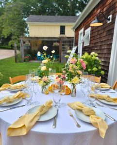 A table setup for a garden party outside of the Carriage House at our New England Bed and Breakfast