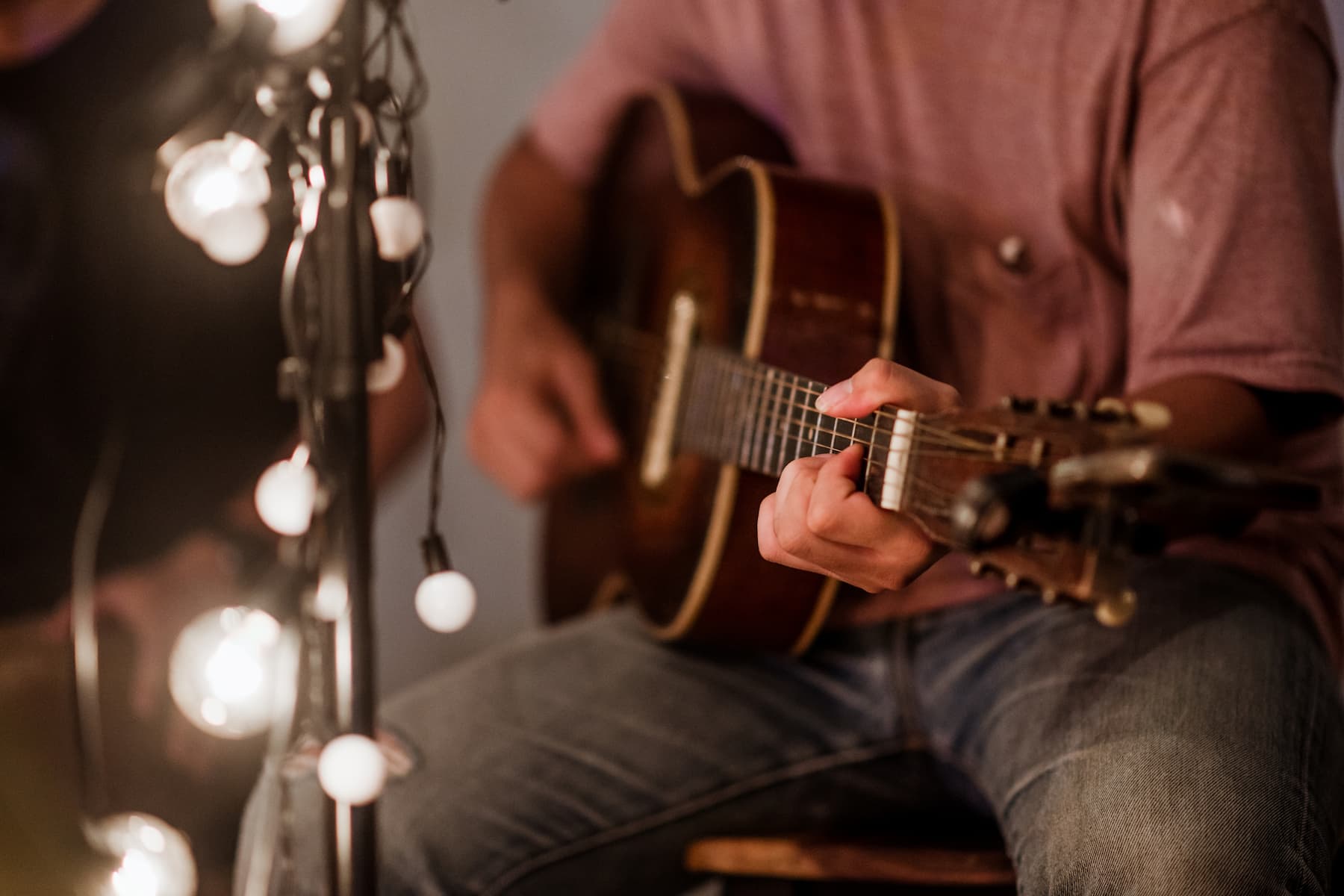 A musician playing at a Rhode Island concert in Westerly